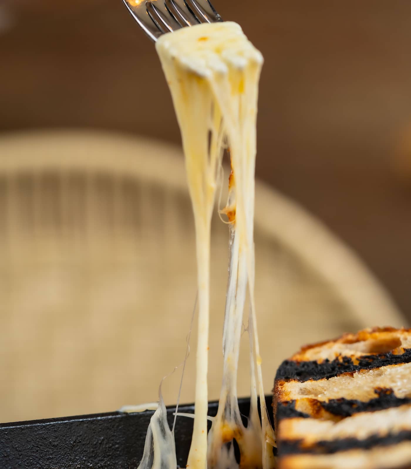 Charred bread meets molten cheese.